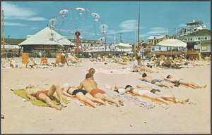 Relaxing in the sun at Old Orchard Beach, Maine
