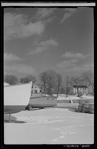 Dry-docked boats, houses, and lobster traps, Ipswich