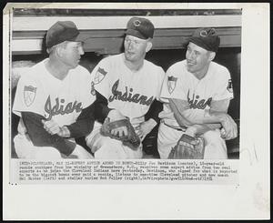 Expert Advice of Added to Bonus-Billy Joe Davidson (center), 18-year-old rookie southpaw from the vicinity of Greensboro, N.C., receives some expert advice from two real experts as he joins the Cleveland Indians here yesterday. Davidson, who signed for what is reported to be the biggest bonus ever paid a rookie, listens to one-time Cleveland pitcher and now coach Mel Harder (left) and Stellar hurler Bob Feller (right).