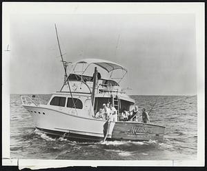 A group of people fishing from the "Melodie II"