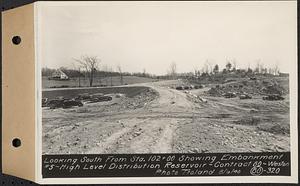 Contract No. 80, High Level Distribution Reservoir, Weston, looking south from Sta. 102+00 showing embankment 5, high level distribution reservoir, Weston, Mass., May 6, 1940