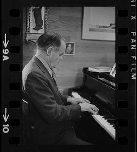 Dr. Robert Pearson playing piano