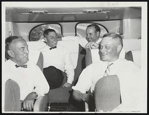 Cranberry Special Underway - Four shirt-sleeved Boston business executives take it easy returning home by chartered bus. Left to right, Charles M. Abbe of Marion, Ralph Aubin of Marion, Ingersall Cunningham of Wareham and Allan Locke of Wareham.