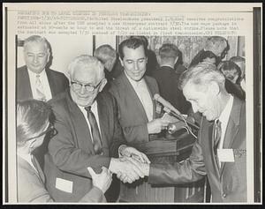 Repeating Due to Level Changes in Previous Transmission: Pittsburgh, PA: United Steelworkers president I.W. Abel receives congratulations from all sides after the USW accepted a three-year contract 7/30. The new wage package is estimated at 90-cents an hour to end the threat of a nationwide steel strike. Please not that the contract was accepted 7/30 instead of 7/29 as listed in the first transmission.