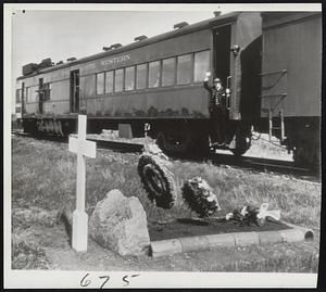 Train Makes Annual Stop at Lonely Grove-To keep a promise made long ago to the parents of a 12-year-old boy, who died as they were pushing westward with a railroad construction crew in 1888, crewmen of a branch passenger line make their annual stop on South Dakota prairie near Elrod to place wreaths on boy's grave.