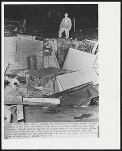 Tilden, Neb. - Looked Up; House Gone! - Walter Staub, Tilden farmer, looks over the rubble left after a tornado destroyed his home Tuesday. Staub said he and his wife just made it to their storm cellar before the tornado hit. The twister ripped off the cellar door and when they looked out the open doorway the house was gone.