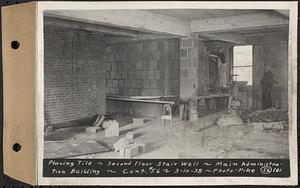 Contract No. 56, Administration Buildings, Main Dam, Belchertown, placing tile, second floor stair well, main administration building, Belchertown, Mass., Mar. 10, 1938