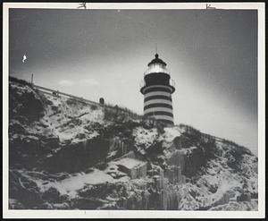 Citadel of Safety. The murky cold of a Maine winter evening descends upon Quoddy Head lighthouse, coast guard-manned citadel of safety near Lebuc, on the desolate shore of the North Atlantic.