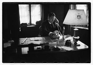 A priest on a phone call
