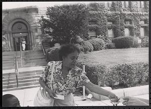 A woman seen outside Cambridge City Hall
