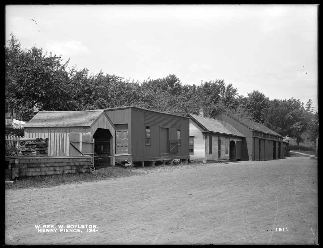 Wachusett Reservoir, Henry Pierce's lumber sheds, in yard of Boston & Maine Railroad, South Boylston Station, from the southeast, West Boylston, Mass., Aug. 2, 1898