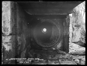 Distribution Department, Low Service Pipe Lines, 30-inch siphon removed at Chelsea North Bridge; interior of pipe, Mystic River; Charlestown; Chelsea, Mass., Nov. 6, 1900