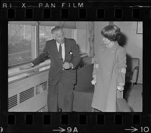 William Perkins, chief of the engineering division of the Veterans Hospital, Jamaica Plain, shows Representative Margaret Heckler some new aluminum siding engineers will install in the hospital walls to reflect heat from radiators