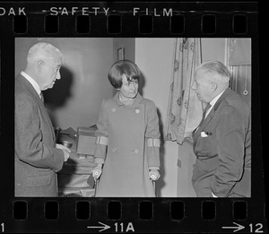 Unidentified man, Representative Margaret Heckler, and William Perkins at Veterans Hospital, Jamaica Plain