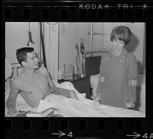 Cong. Margaret Heckler visits with wounded Marine Cpl. Charles Wheeler of Leominster during her inspection of Veterans Hospital in Jamaica Plain