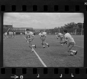Boston College football players Fred Willis, Gene Comella, Dave Bennett, and Mike Fallon during workouts