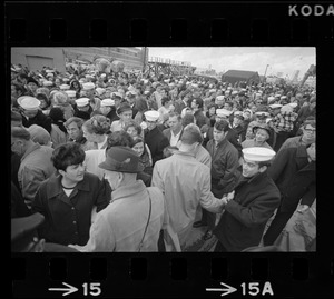 Families and sailors reuniting upon arrival of U. S. S. Boston at South Boston Naval Annex
