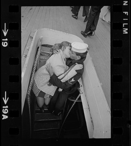 Families and sailors reuniting upon arrival of U. S. S. Boston at South Boston Naval Annex