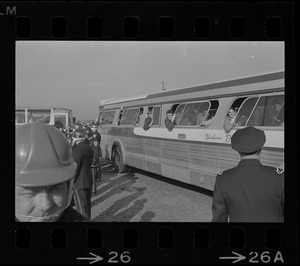 Bus carrying draftees passing anti-war protest at Boston Army Base