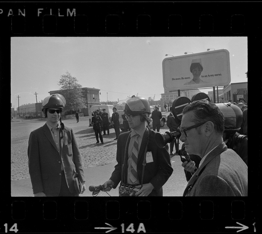 Journalists at anti-war protest at Boston Army Base