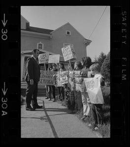 John J. Kerrigan with students picketing against teachers' strike outside his office