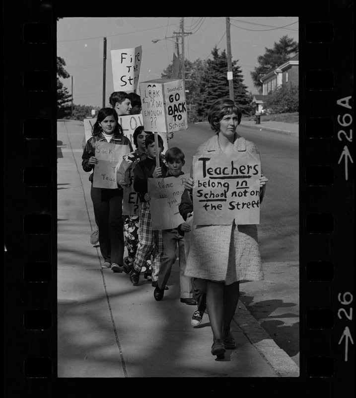 Students picketing against teachers' strike outside office of John J. Kerrigan