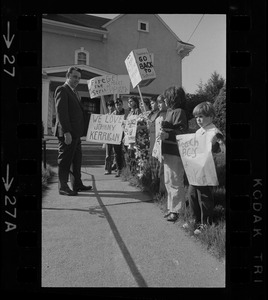 John J. Kerrigan with students picketing against teachers' strike outside his office