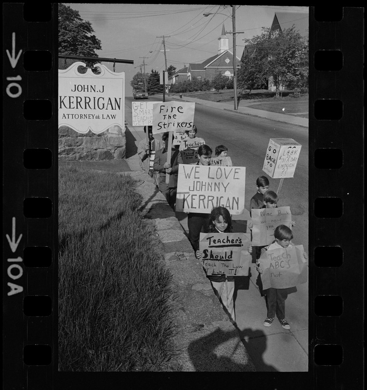 Students picketing against teachers' strike outside office of John J. Kerrigan