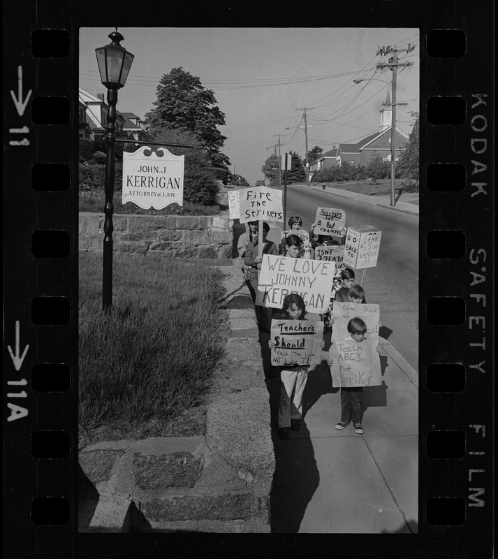 Students picketing against teachers' strike outside office of John J. Kerrigan