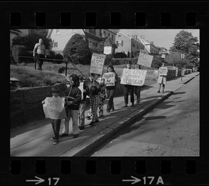 Students picketing against teachers' strike outside office of John J. Kerrigan