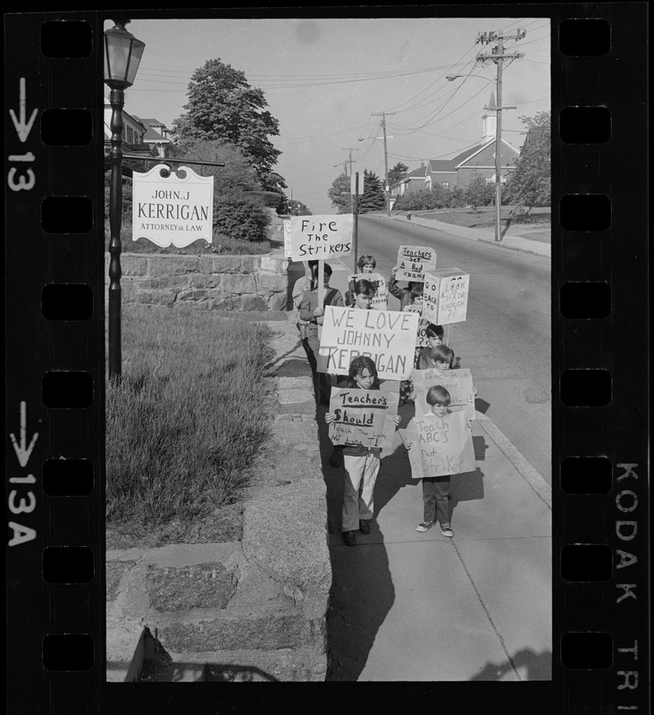 Students picketing against teachers' strike outside office of John J. Kerrigan