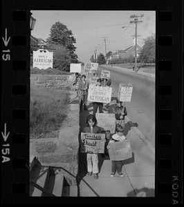 Students picketing against teachers' strike outside office of John J. Kerrigan