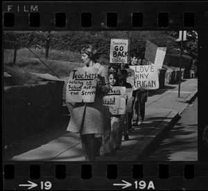 Students picketing against teachers' strike outside office of John J. Kerrigan