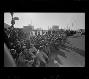 Anti-war protesters block the gates to the Boston Army Base -- temporarily -- to stop the entrance of busses carrying draftees