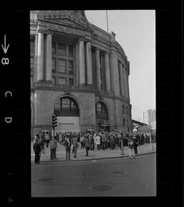 Anti-war protesters gathering at South Station before marching to Boston Army Base