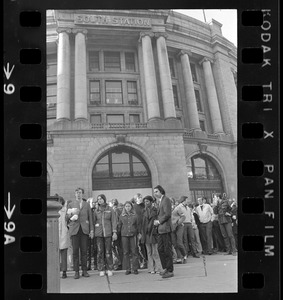 Anti-war protesters gathering at South Station before marching to Boston Army Base