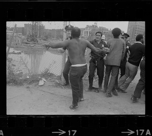 Boston police and demonstrators scuffle as arrests begin at Boston City Hospital construction site protest