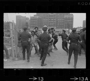 Boston police and demonstrators scuffle as arrests begin at Boston City Hospital construction site protest