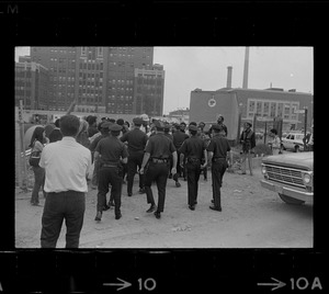 Boston police and demonstrators scuffle as arrests begin at Boston City Hospital construction site protest