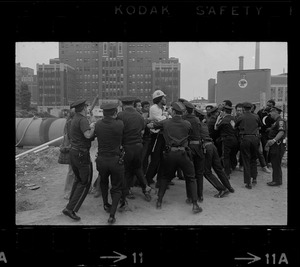 Boston police and demonstrators scuffle as arrests begin at Boston City Hospital construction site protest