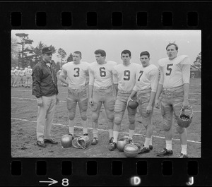 Boston College football coach Joe Yukica with players