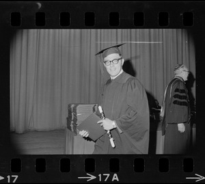 Graduate Peter A. Bradley at University of Massachusetts commencement in War Memorial Auditorium