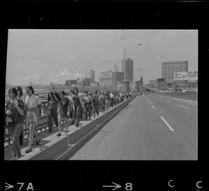 Anti-war protesters crossing Longfellow Bridge