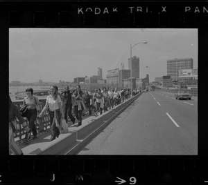 Anti-war protesters crossing Longfellow Bridge
