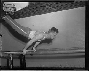 Gymnasts, on the balance beam