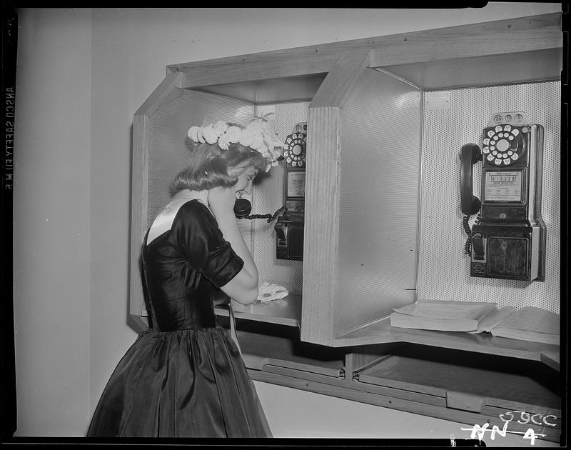 The 1960 Homecoming Queen on a payphone