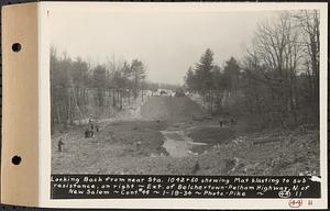 Contract No. 44, Extension of Belchertown-Pelham Highway, New Salem, Orange, looking back from near Sta. 1042+50 showing mat blasting to sub resistance on right, New Salem, Mass., Jan. 19, 1934