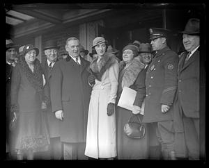 James Curley and his daughter Mary standing in the middle of a crowd