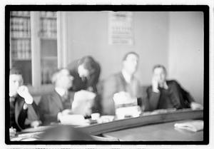 Group of men at table