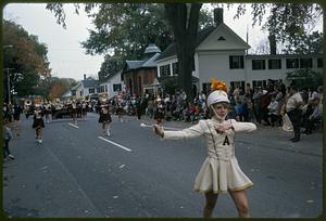 Westford Academy majorette leading the marching band in the bicentennial parade
